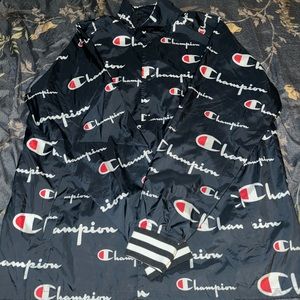 Champion hoodless navy blue and white and red rain jacket